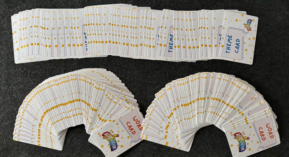 Set of fanned-out Theme Cards and Word Cards from Acrosticism The Backronym Party Game