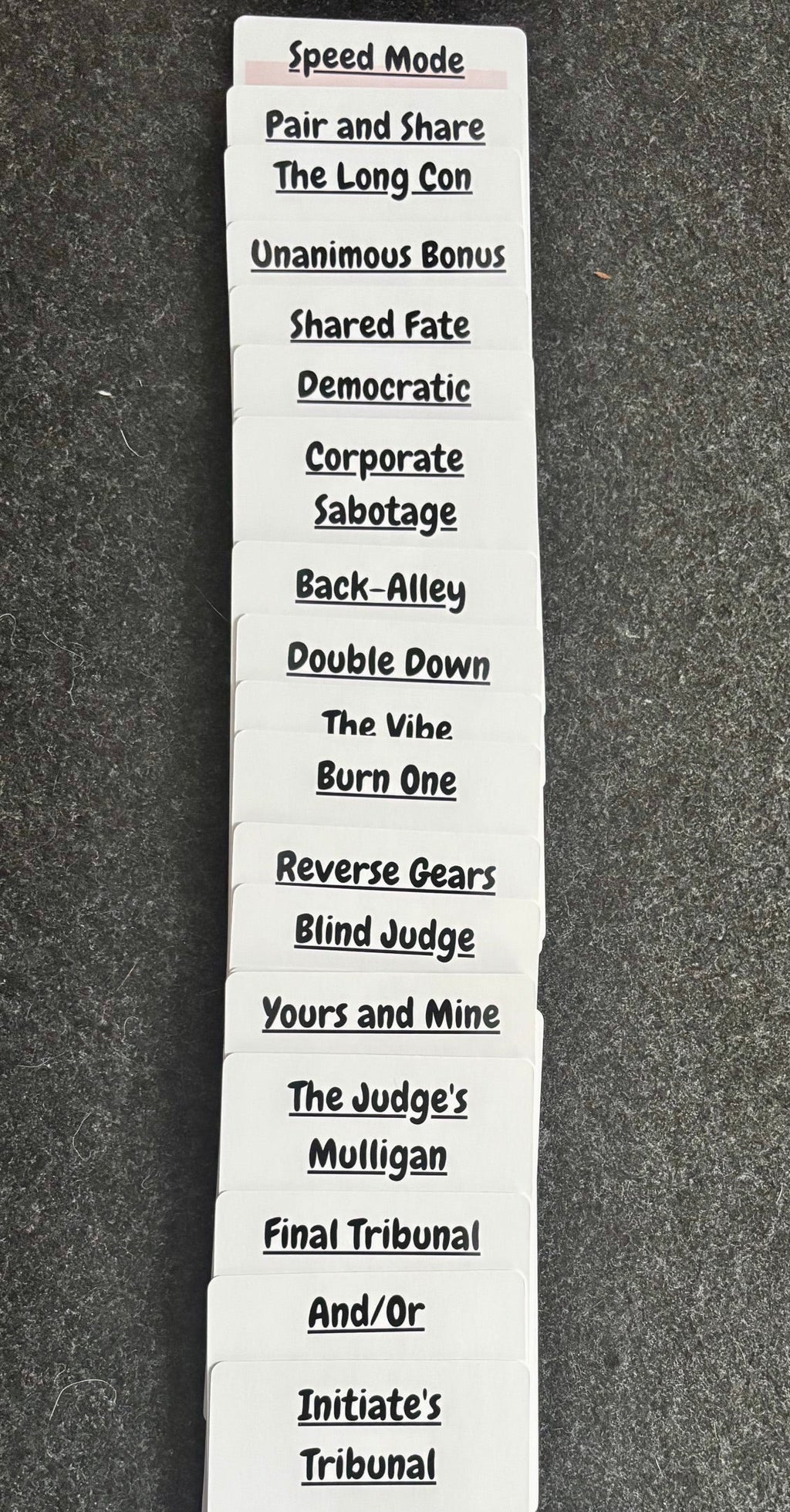 Stack of Chaotic Remixes rule cards showing titles like Speed Mode, The Long Con, Blind Judge