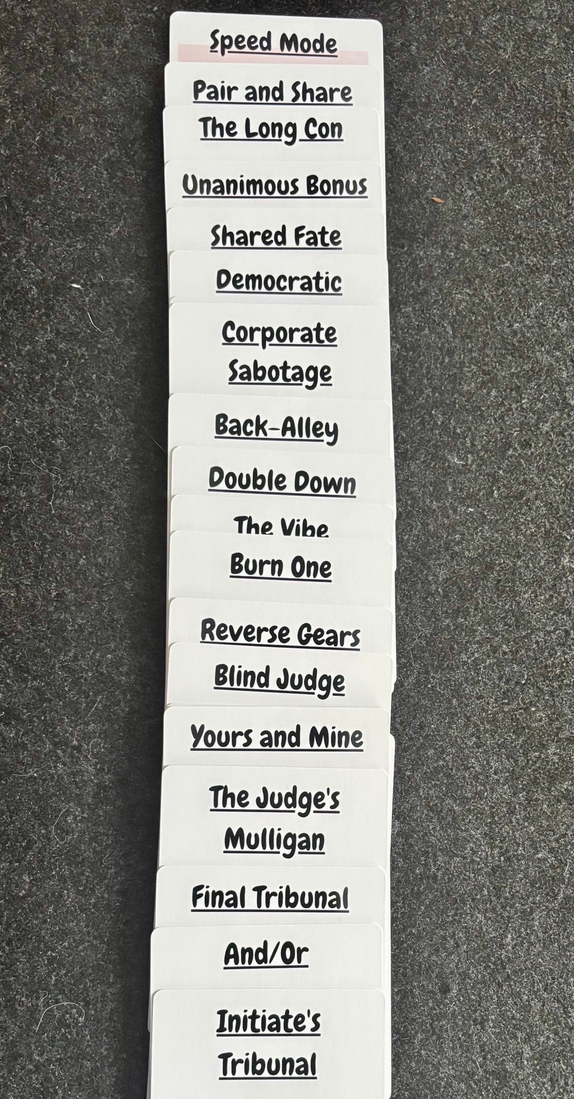 Stack of Chaotic Remixes rule cards showing titles like Speed Mode, The Long Con, Blind Judge